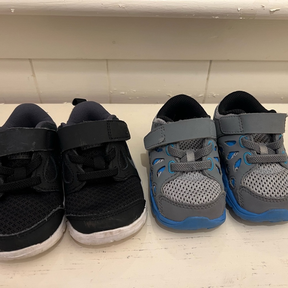 TWO pairs of Nike sneakers for baby